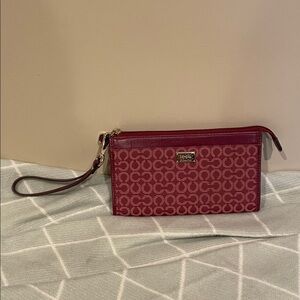 Red burgundy  Signature Coach Pattern Wristlet
